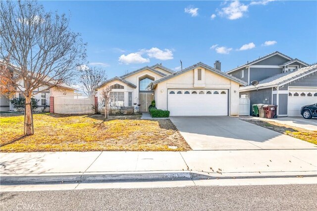 view of front of home with a garage