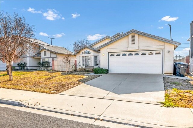 single story home featuring a garage