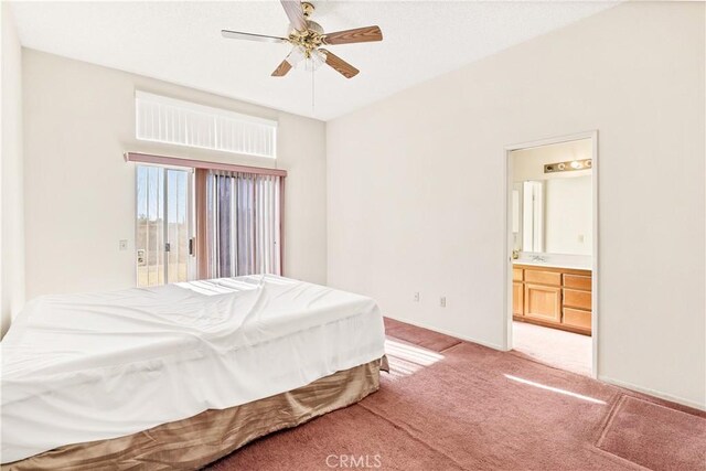 bedroom featuring ceiling fan, light carpet, and connected bathroom