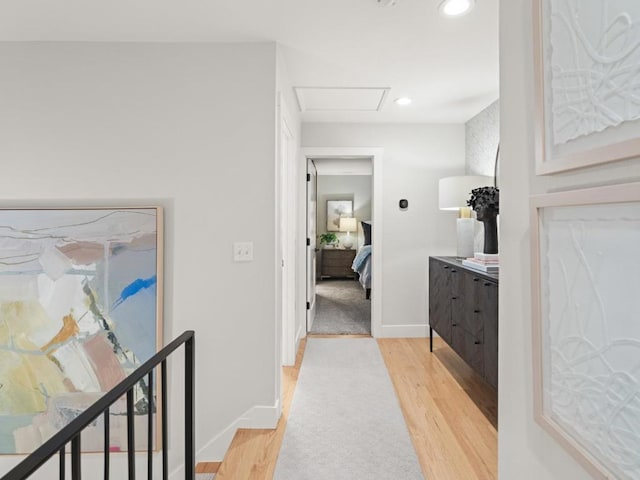 hallway with light wood-type flooring