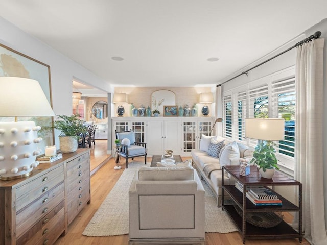 living room with light hardwood / wood-style floors