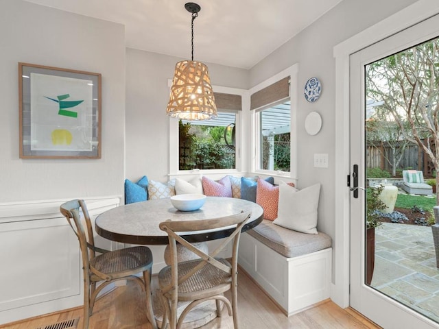 dining area featuring light hardwood / wood-style floors and breakfast area