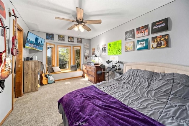 bedroom with ceiling fan and carpet flooring