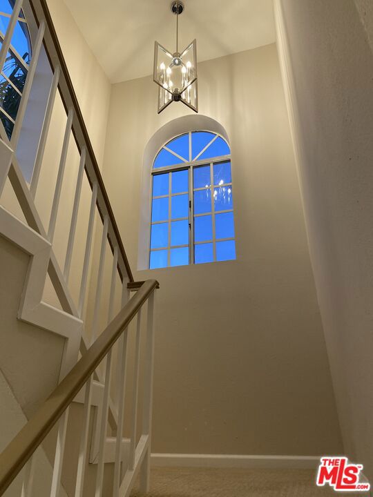 entrance foyer with a notable chandelier