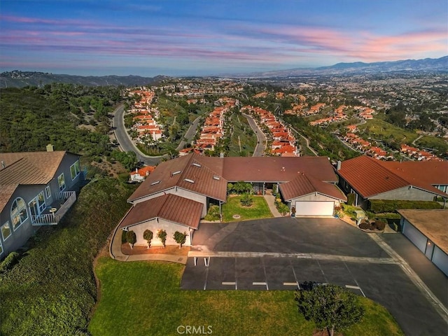 birds eye view of property with a residential view