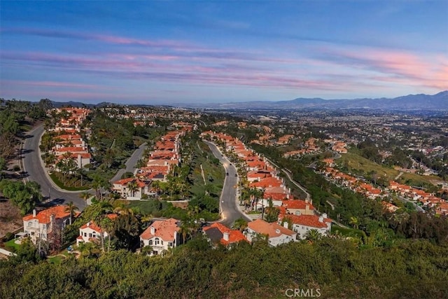 bird's eye view featuring a residential view and a mountain view