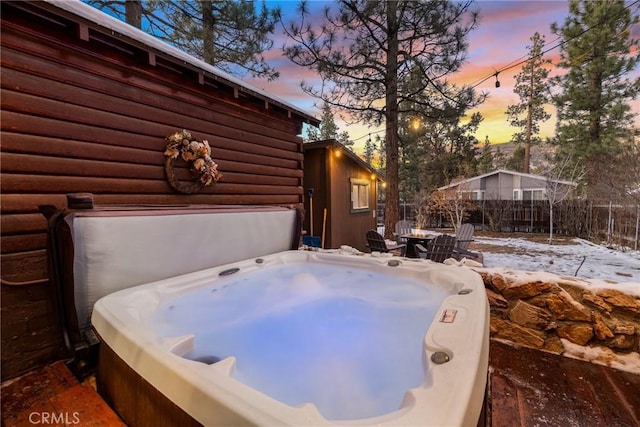 exterior space featuring a hot tub