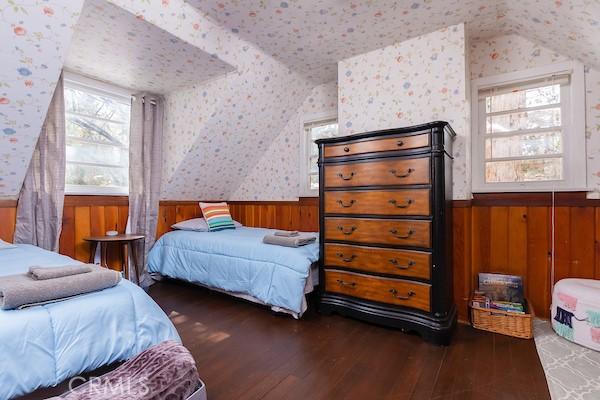 bedroom featuring dark wood-type flooring