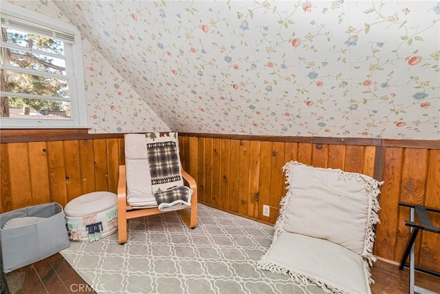 sitting room featuring lofted ceiling