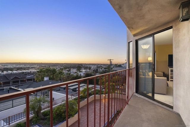 view of balcony at dusk