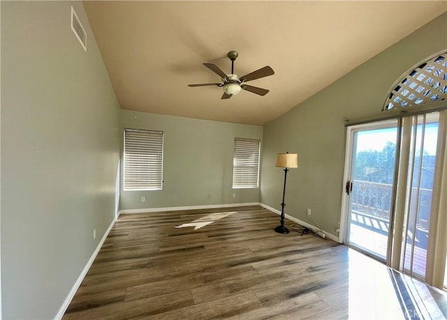 unfurnished room featuring ceiling fan, vaulted ceiling, and hardwood / wood-style floors