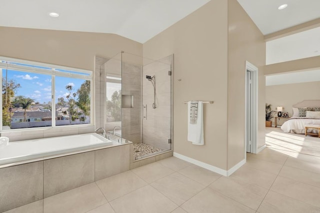 bathroom with tile patterned flooring, plus walk in shower, and lofted ceiling