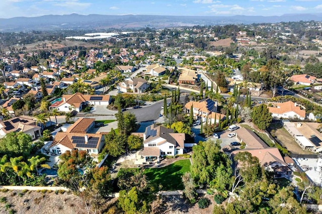 bird's eye view with a mountain view