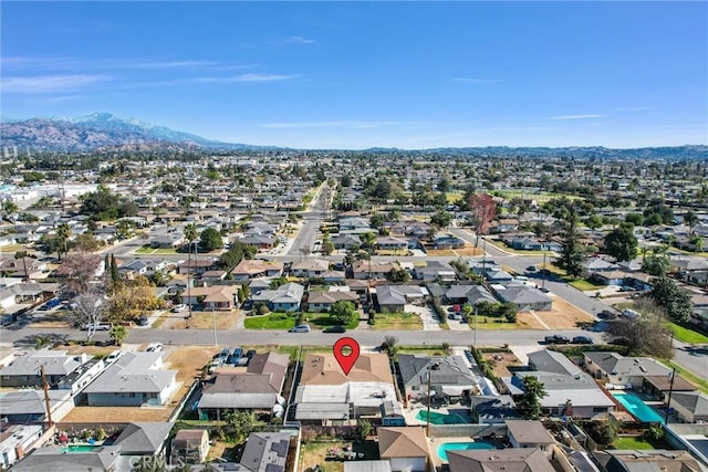 1307 N O Malley Ave, Covina, CA 91722 - aerial view of property and surrounding area with nearby suburban area and a mountainous background