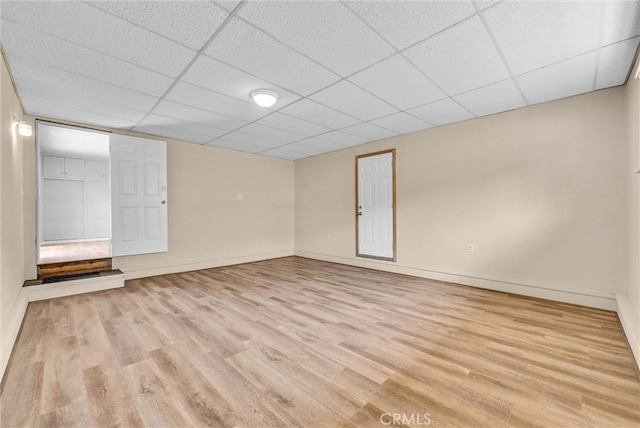 1307 N O Malley Ave, Covina, CA 91722 - empty room with wood finished floors and a paneled ceiling