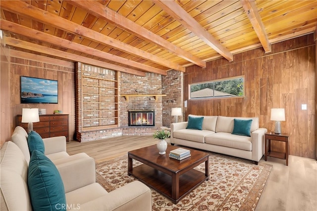 1307 N O Malley Ave, Covina, CA 91722 - living area with wood ceiling with exposed beams, wooden walls, wood finished floors, and a brick fireplace