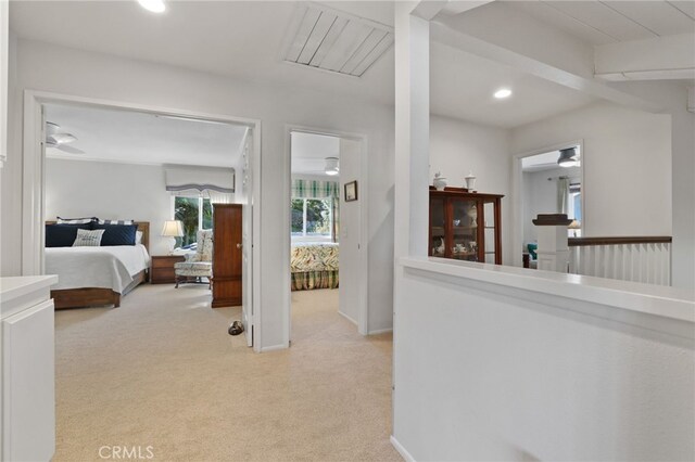 interior space featuring light colored carpet