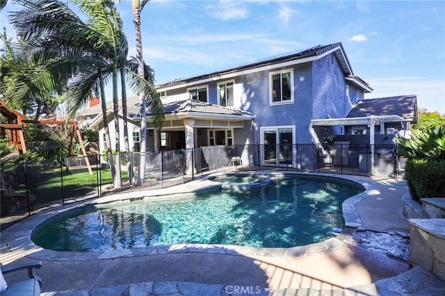 view of swimming pool featuring an in ground hot tub, a patio, and a pergola