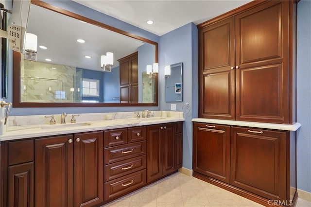 bathroom featuring a shower and vanity