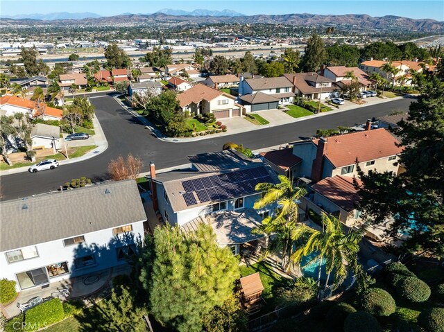 drone / aerial view featuring a mountain view