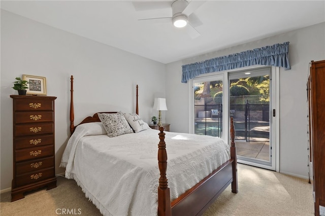 carpeted bedroom with ceiling fan and access to exterior