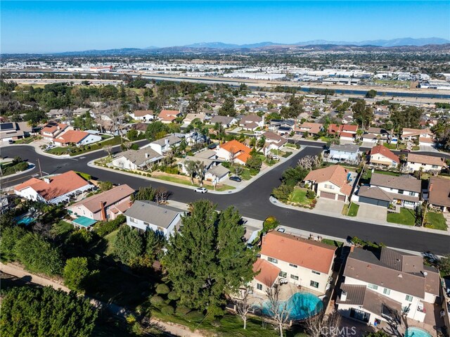 drone / aerial view featuring a mountain view