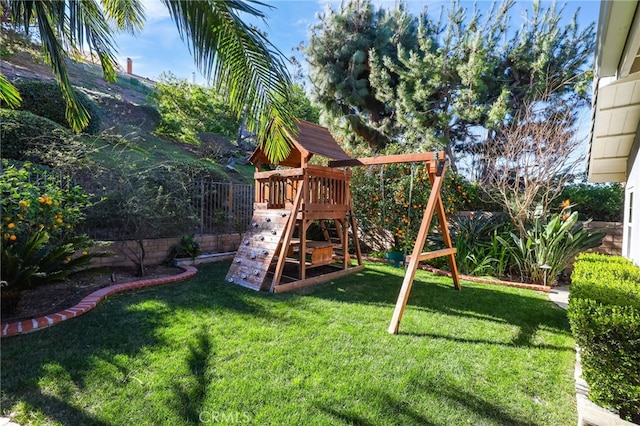 view of playground featuring a lawn