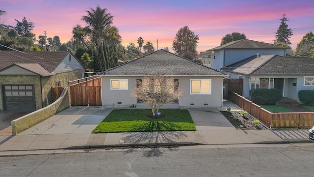 view of front of property featuring a garage