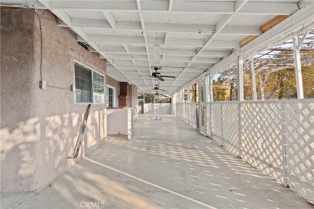 view of patio featuring ceiling fan