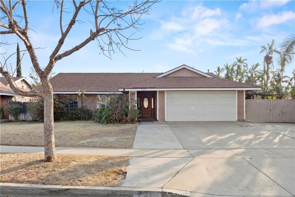 ranch-style home with a garage