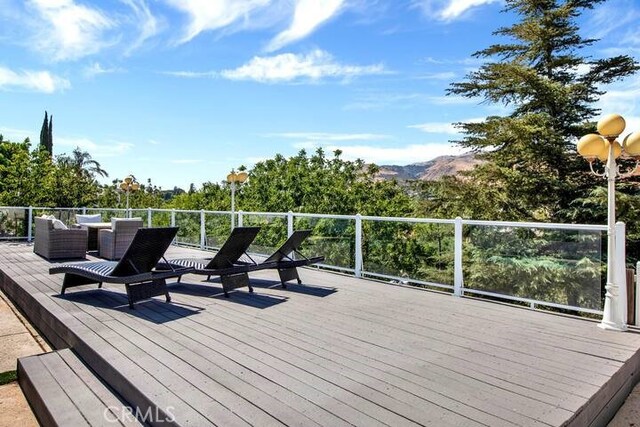 deck with a mountain view