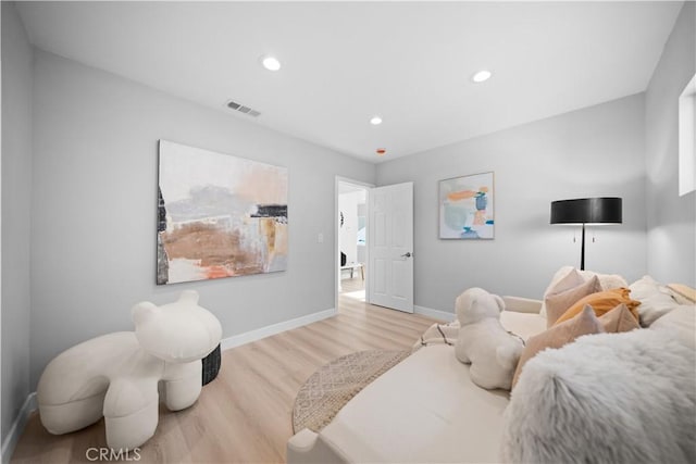 bedroom with light wood-type flooring