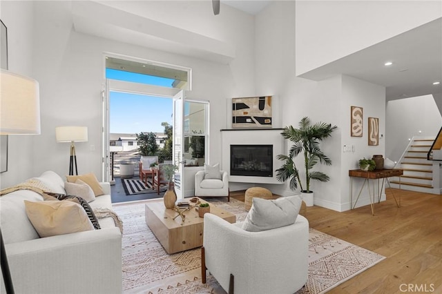 living room with light hardwood / wood-style flooring