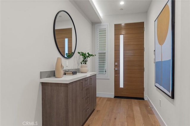 entryway with light wood-type flooring