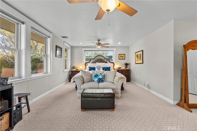 bedroom featuring light carpet, recessed lighting, visible vents, and baseboards