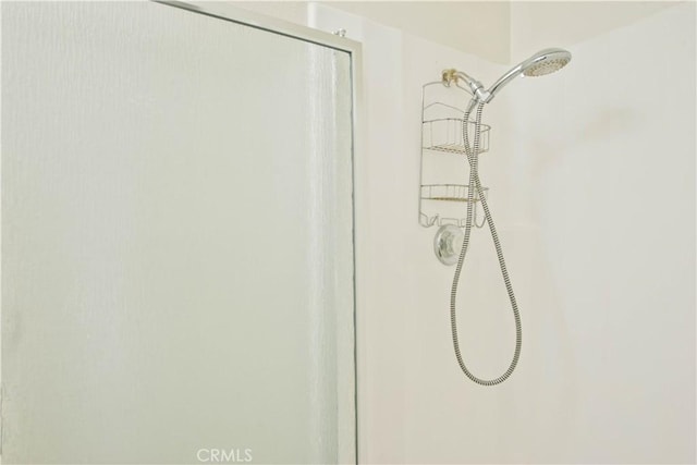 room details with an enclosed shower