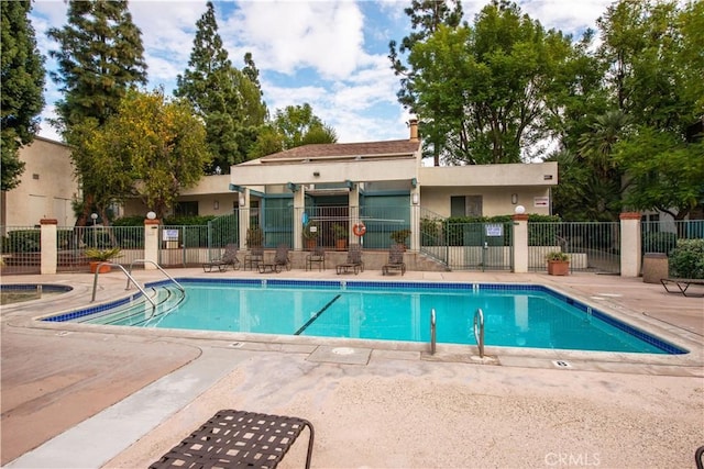 view of pool featuring a patio area