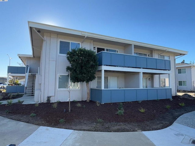 view of property exterior featuring a balcony