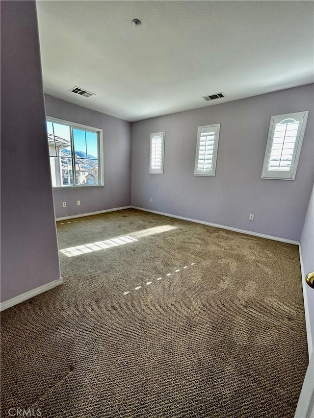 view of carpeted spare room