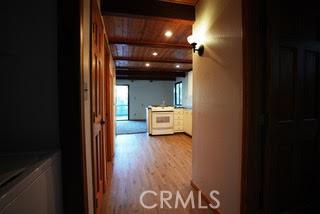 hallway featuring hardwood / wood-style floors