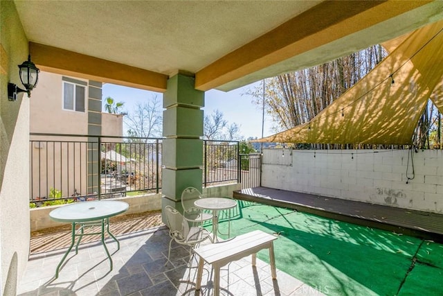 balcony featuring a patio area