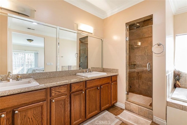 bathroom featuring ornamental molding, separate shower and tub, vanity, and tile patterned floors