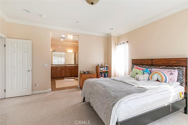 bedroom featuring crown molding, multiple windows, connected bathroom, and light carpet