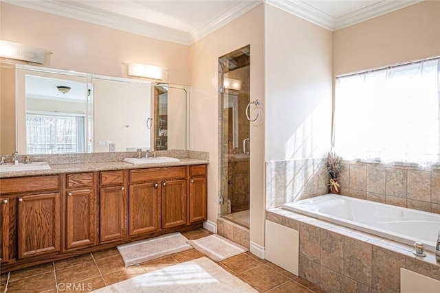 bathroom featuring ornamental molding, vanity, tile patterned floors, and plus walk in shower