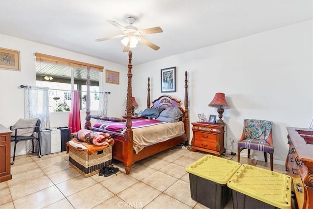 tiled bedroom with ceiling fan