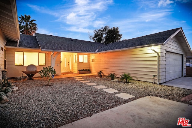 exterior space with a garage