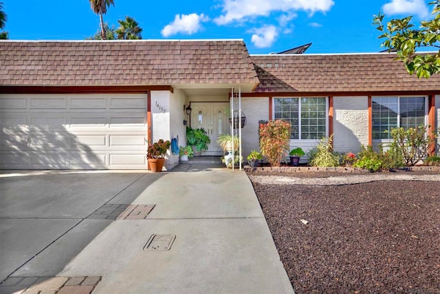 ranch-style home with a garage