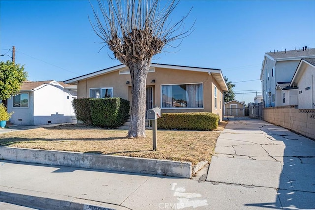 view of front of property with a front lawn