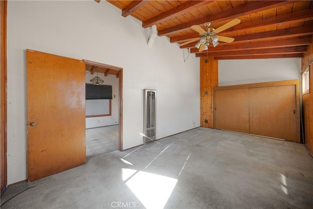 unfurnished room with high vaulted ceiling, wooden ceiling, ceiling fan, and beam ceiling