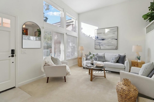 living room with light colored carpet